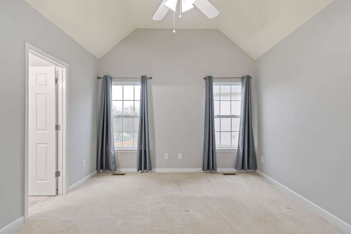 Primary Bedroom: Walk-in closet & full bath with soaker tub and double vanities