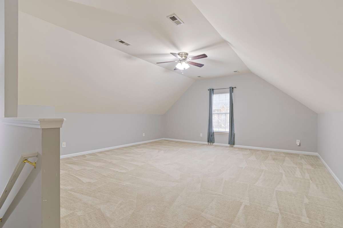 Bonus Room: Above garage with large closet and access to attic