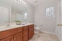 Primary Bedroom: Walk-in closet & full bath with soaker tub and double vanities