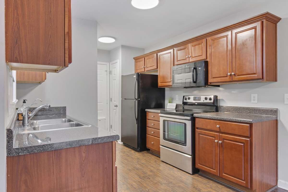 Kitchen: leading to garage, pantry and laundry closet. Garage has built in shelving.