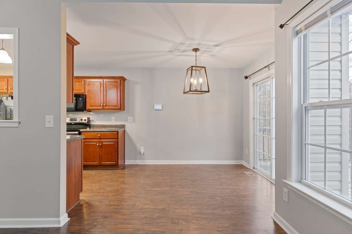 Combination Dining Area: access to Trex deck and backyard