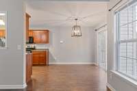 Combination Dining Area: access to Trex deck and backyard