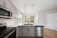 Home Under Construction - SAMPLE Photos Selections will vary ~ Cabinets will be white with Black Hardware