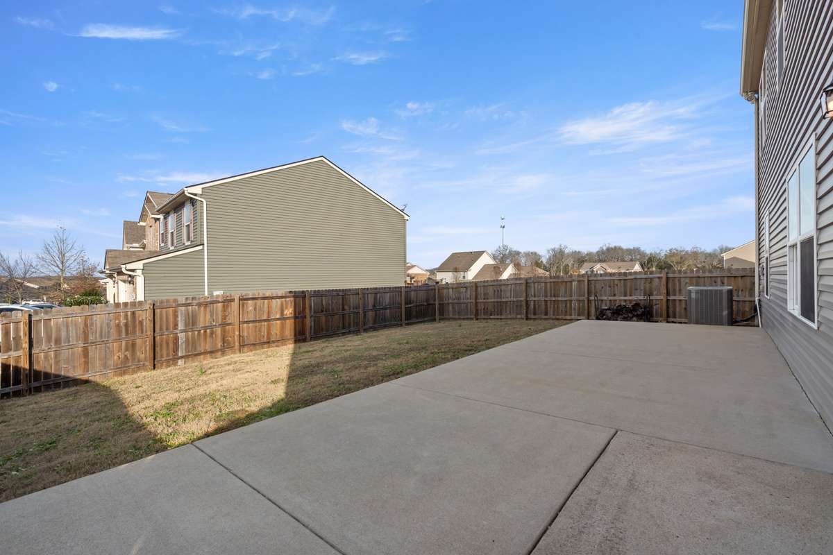 Nice large extended patio for entertaining is a great improvement to this fully fenced back yard.