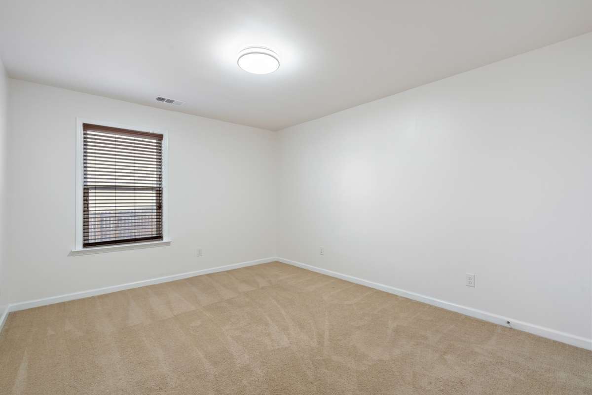 Guest suite on ground level with large walk in closet.