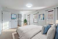 Virtually staged secondary bedroom.