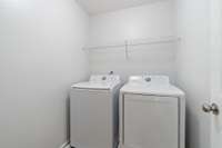 Laundry located on second floor with bedrooms for convenience.