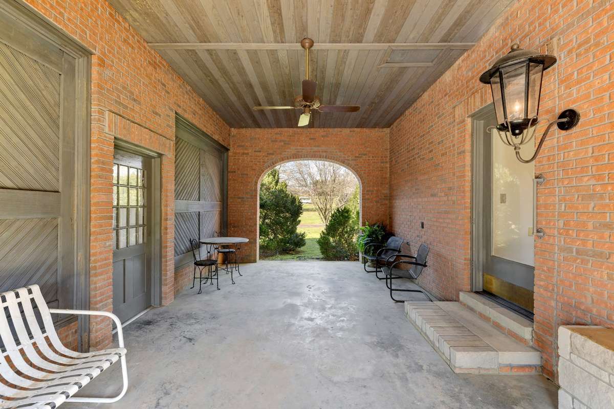 Breezeway. Beautiful garage is to the left.