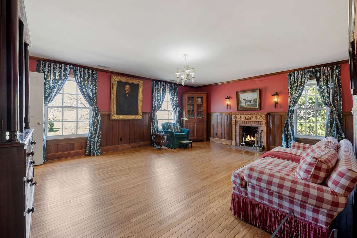 Upstairs Den with wood-burning fireplace
