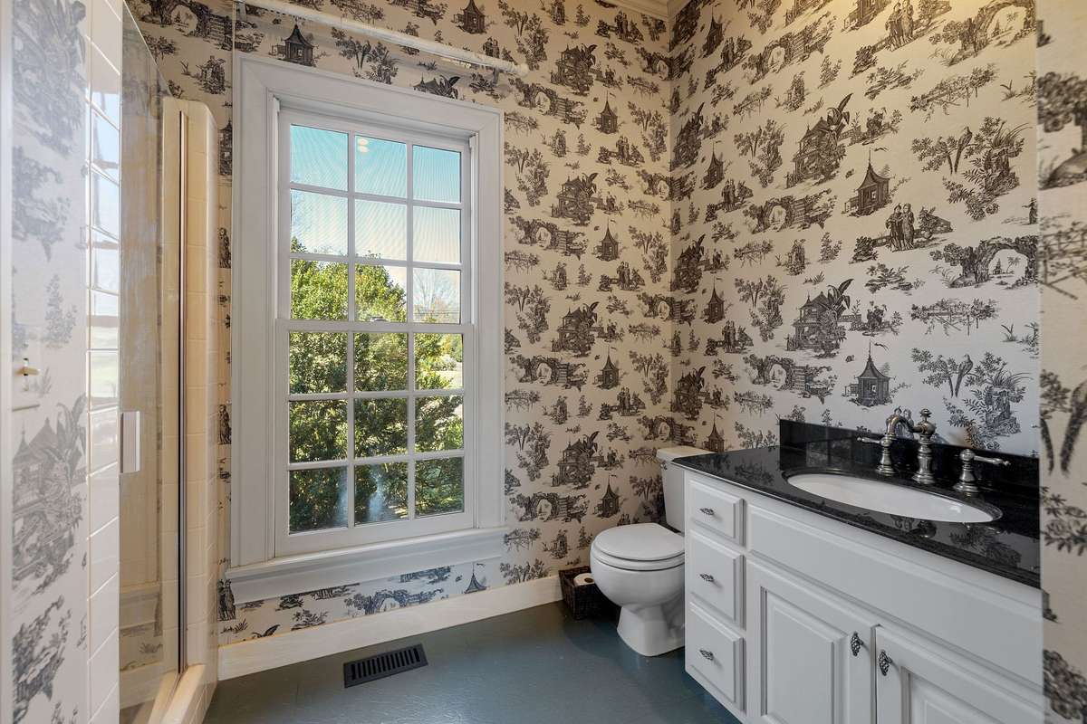 Bathroom with shower is off the kitchen and breezeway