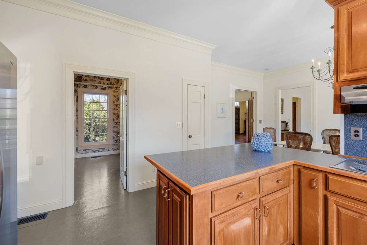 Full bathroom is off the kitchen