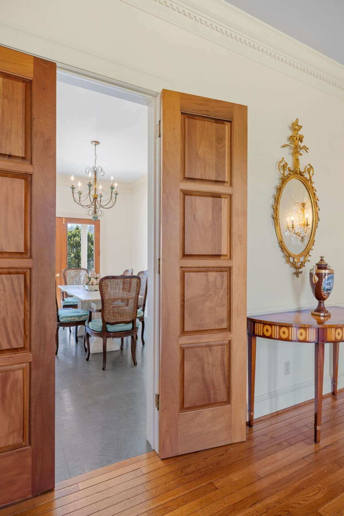 Double woods doors open into the breakfast room