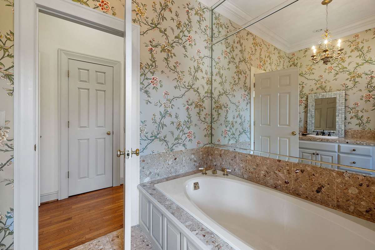 The large walk-in closet is in the hallway