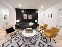 Accent wall and blinds throughout