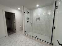 Framless tile shower with great water pressure!