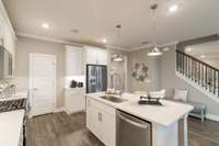 *Photos are of a model home of a similar floorplan. Actual colors, structural selections, and finishes may vary.