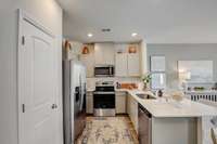 Photos are of our model home.  Some decorator items are not included.