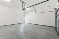 Garage from far corner looking at door to courtyard.