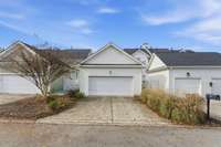 Garage at rear of house with alley entrance.