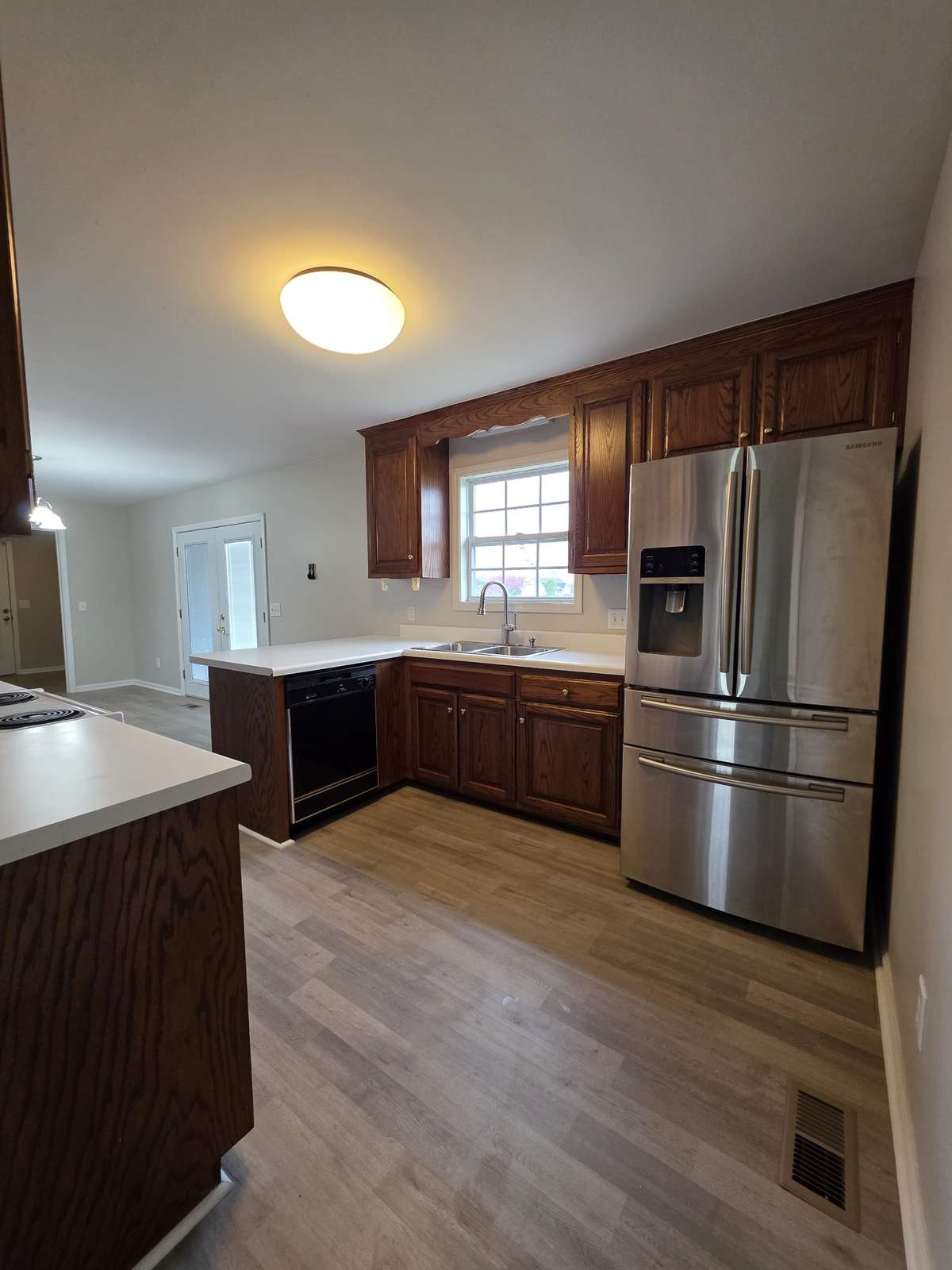 Stainless Refrigerator Included!