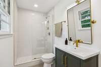 Tile shower and gorgeous vanity...check out my brushed bronze!