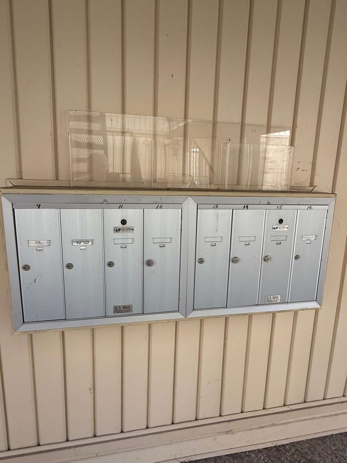 There is a bank of mail boxes for each building - for this condo, the mail boxes are just outside the front door!