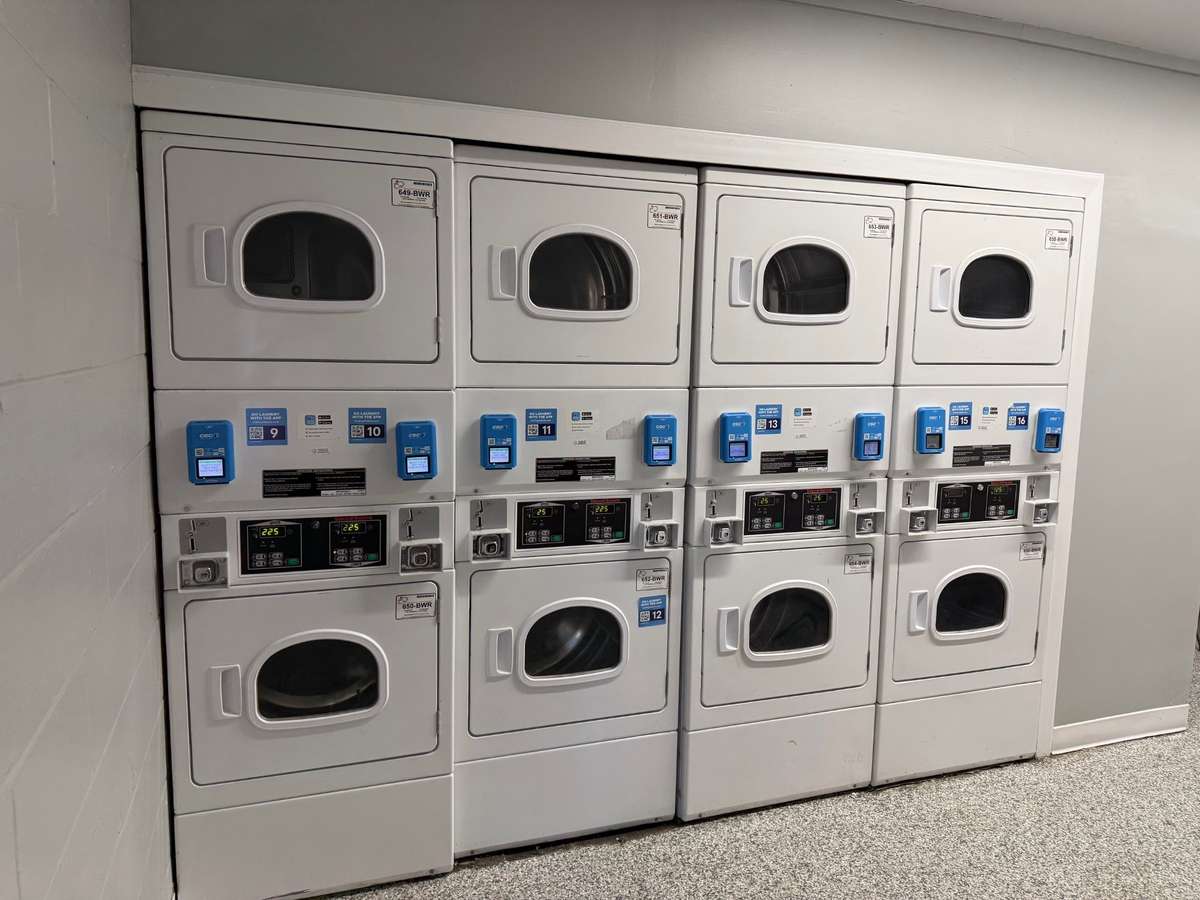 Hobbs House has a community laundry room for it's residents! There are 8 dryers here.