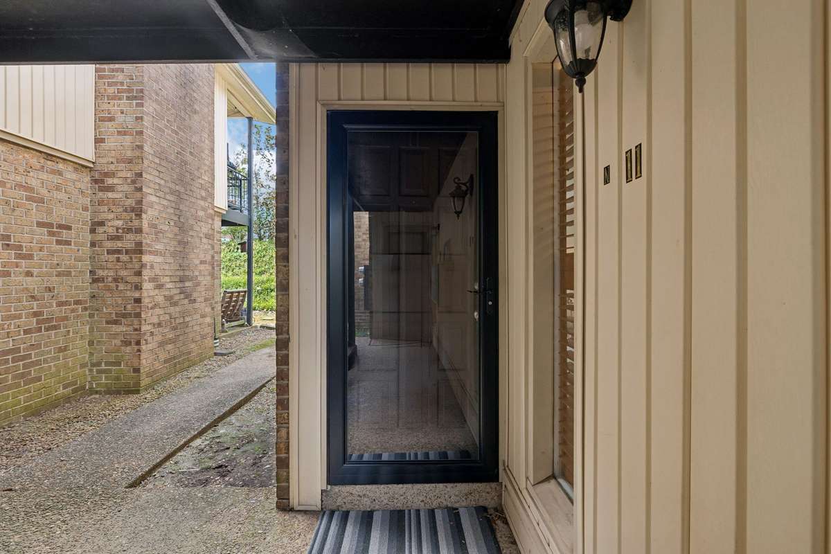 The door to Building N, Unit 11.