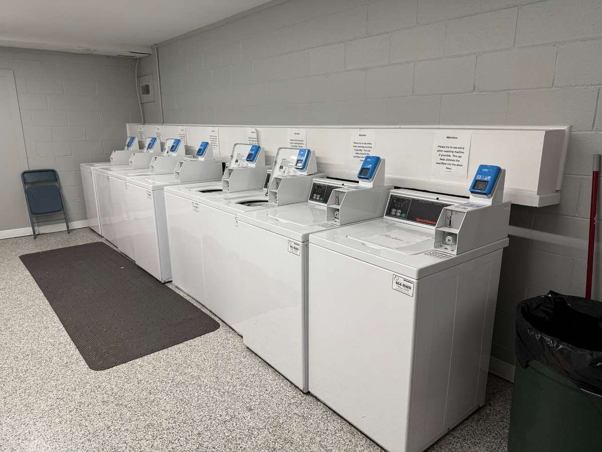 On the other side of the room, there are 8 washers!