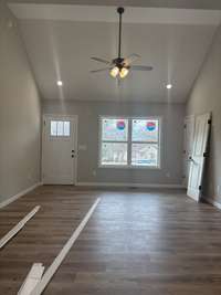 Vaulted Ceiling in Living Rm with Recessed Lighting