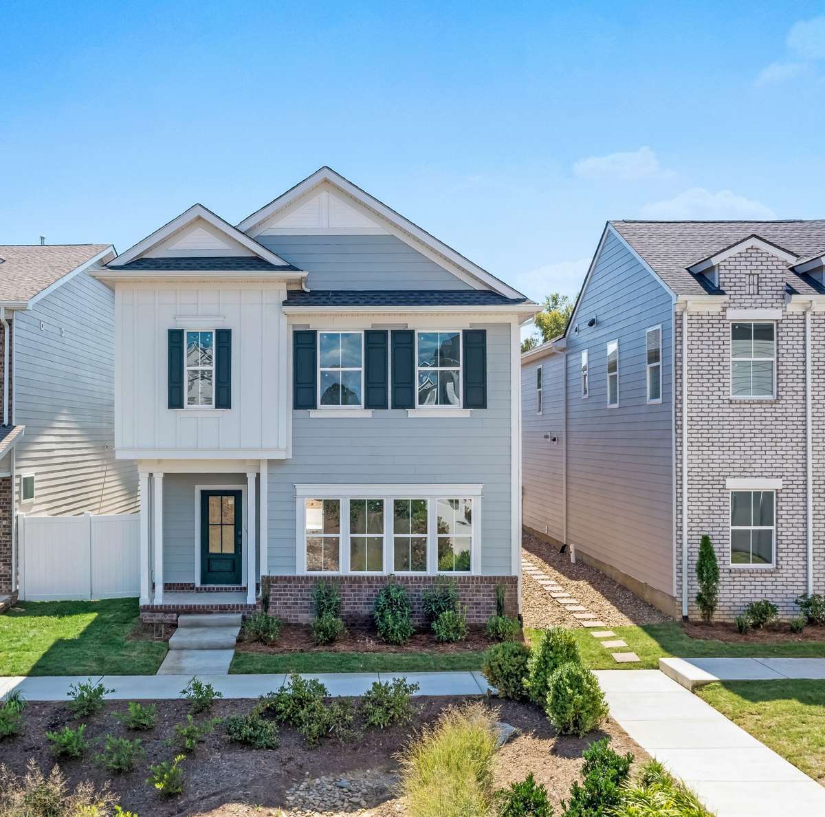 The Madison Americana. This gorgeous home is under construction and almost complete! This homesite offers beautiful views overlooking the rain gardens!