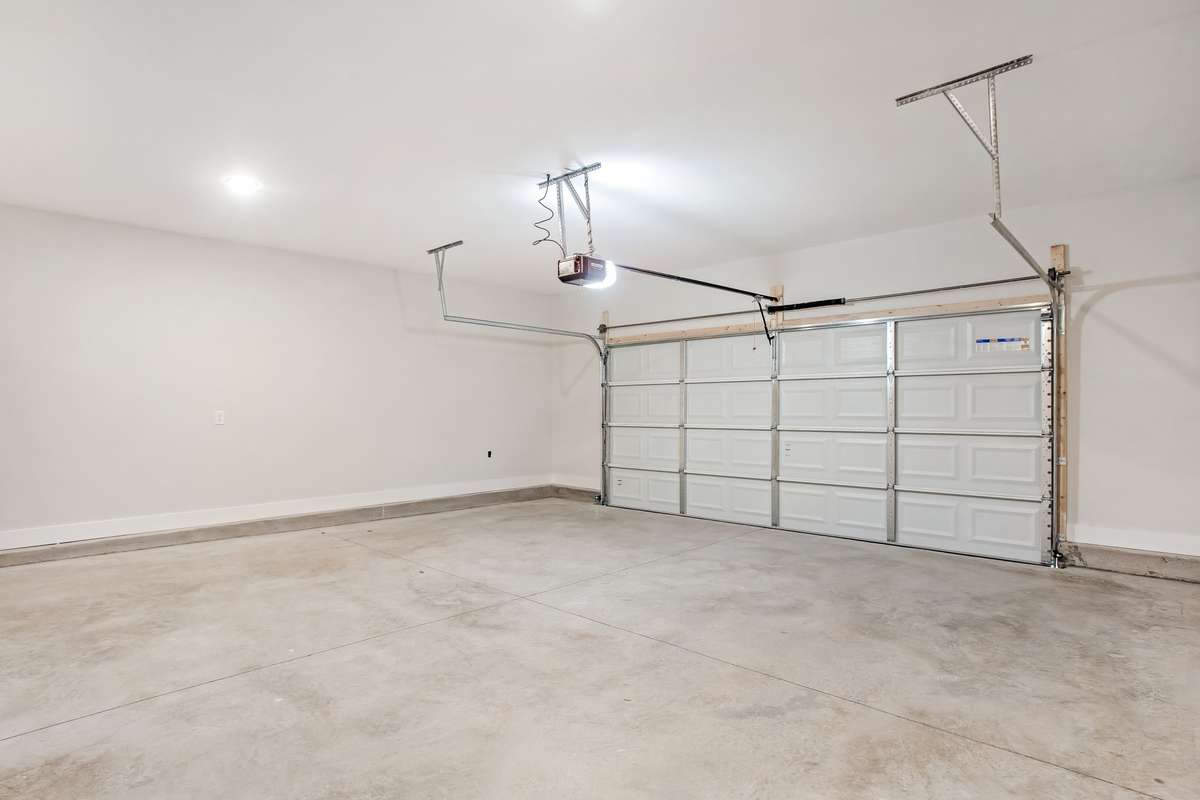 Picture is of the Madison Americana built on another lot. OVERSIZED two car garages and Tankless Water Heaters!