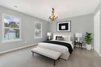 Bedroom 2 with en suite bath - staged