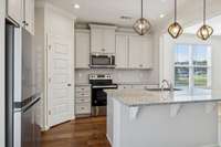 The closed door is the pantry.