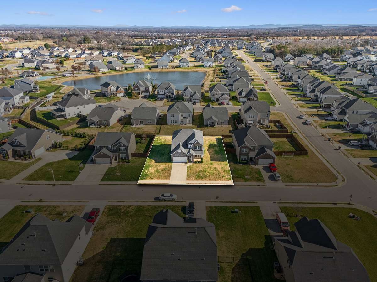 Aerial view of subdivision and lake