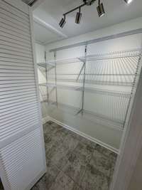 Large walk in pantry for all of your storage needs and right in the laundry room.  Convenient!