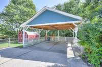 2 car carport which could easily be enclosed for a garage.