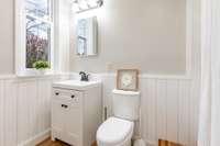 Full Bath #3 located in the Mother-in-law Suite features a quiet, tucked away setting with neutral finishes and ample natural light.