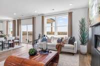 This is a photo of one of our model homes. Please know that some of the exterior and interior finishes, paint, and features may vary.