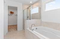 This is a photo of one of our model homes. Please know that some of the exterior and interior finishes, paint, and features may vary.