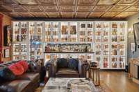 This is a great game room, potential for a pool table as well.