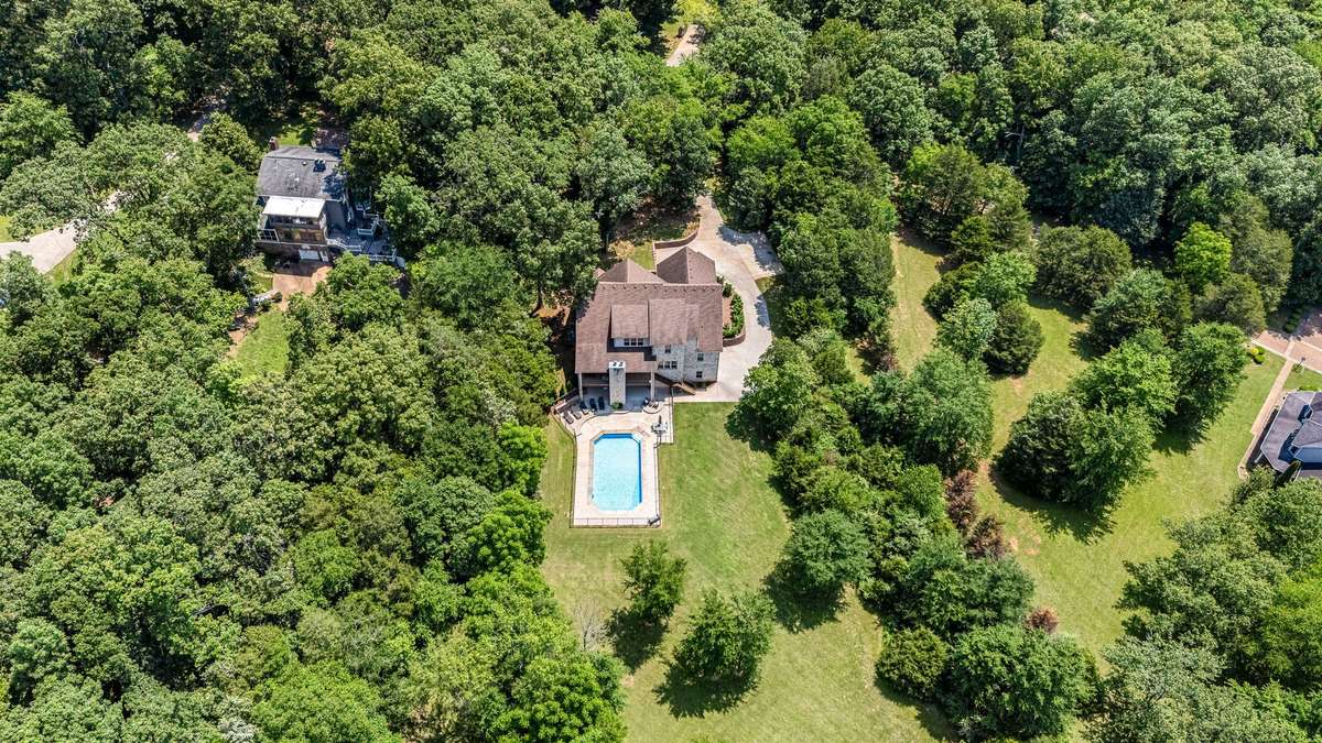 Double decker covered back porches with views for miles and both with wood burning fireplaces.