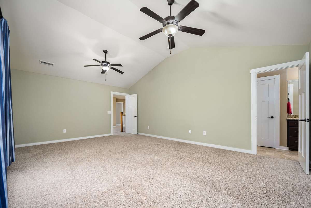 Another look at Bedroom 3 upstairs. It also has an ensuite bath.