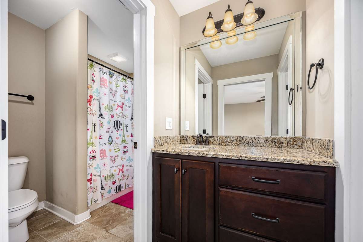 Jack n Jill bath connects Bedrooms 4 and 5 upstairs.