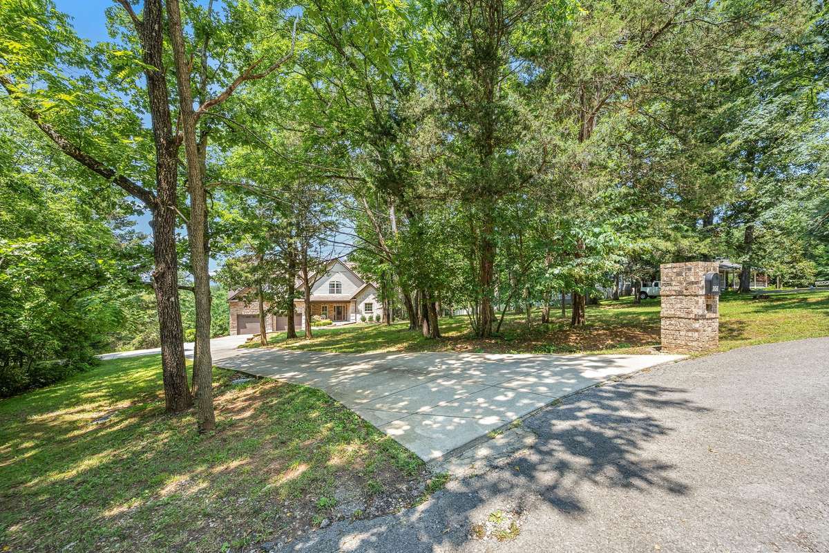 This one owner, custom built home has everything you are looking for on 5 unrestricted acres just 1 mile outside the city limits.