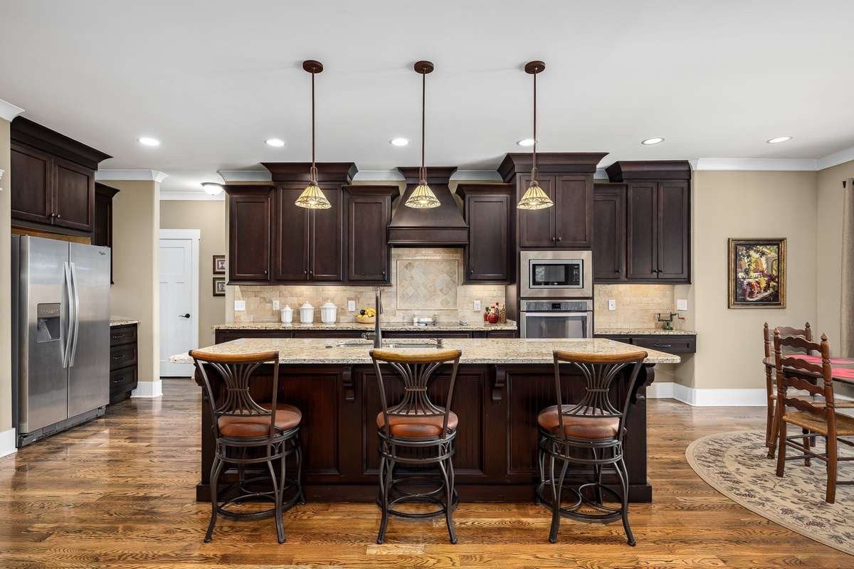 Stainless appliances, coffee nook, corner desk and sand & finish hardwood floors.