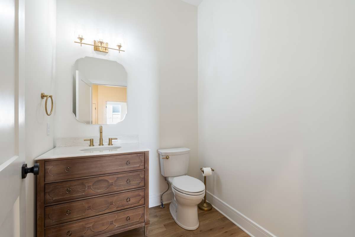 Half bath located in the main hallway