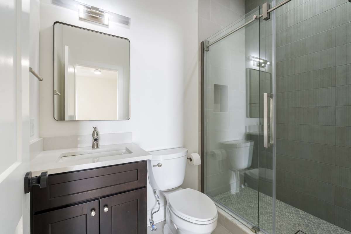 The full bathroom that serves the downstairs bathroom
