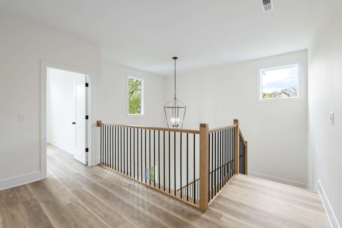Top of the stairs on the second level