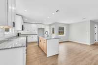 Granite counters, stainless steel appliances, recessed lighting!